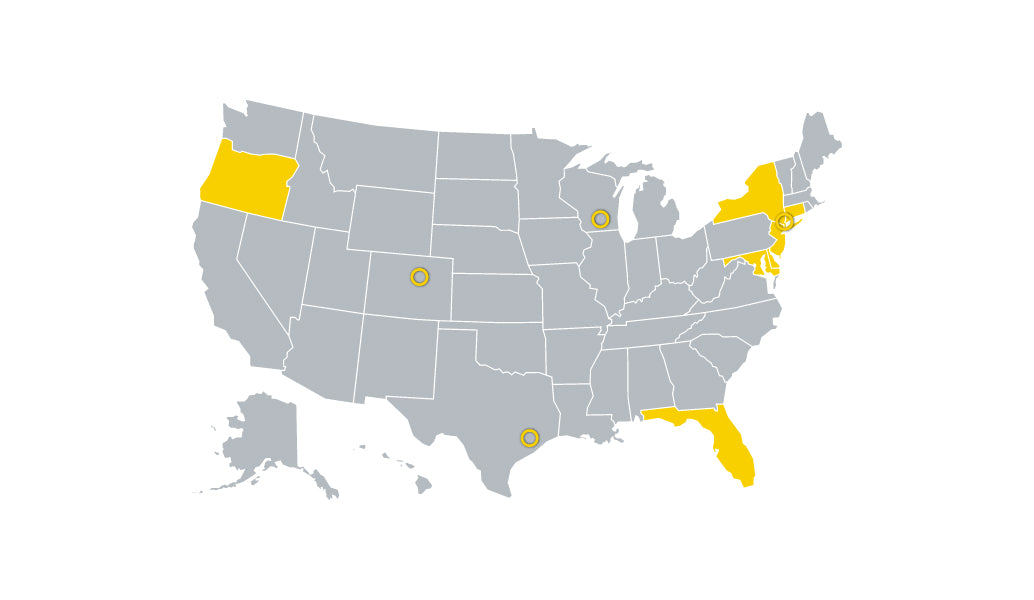 US map showing states in yellow that require 10-year battery alarms in schools